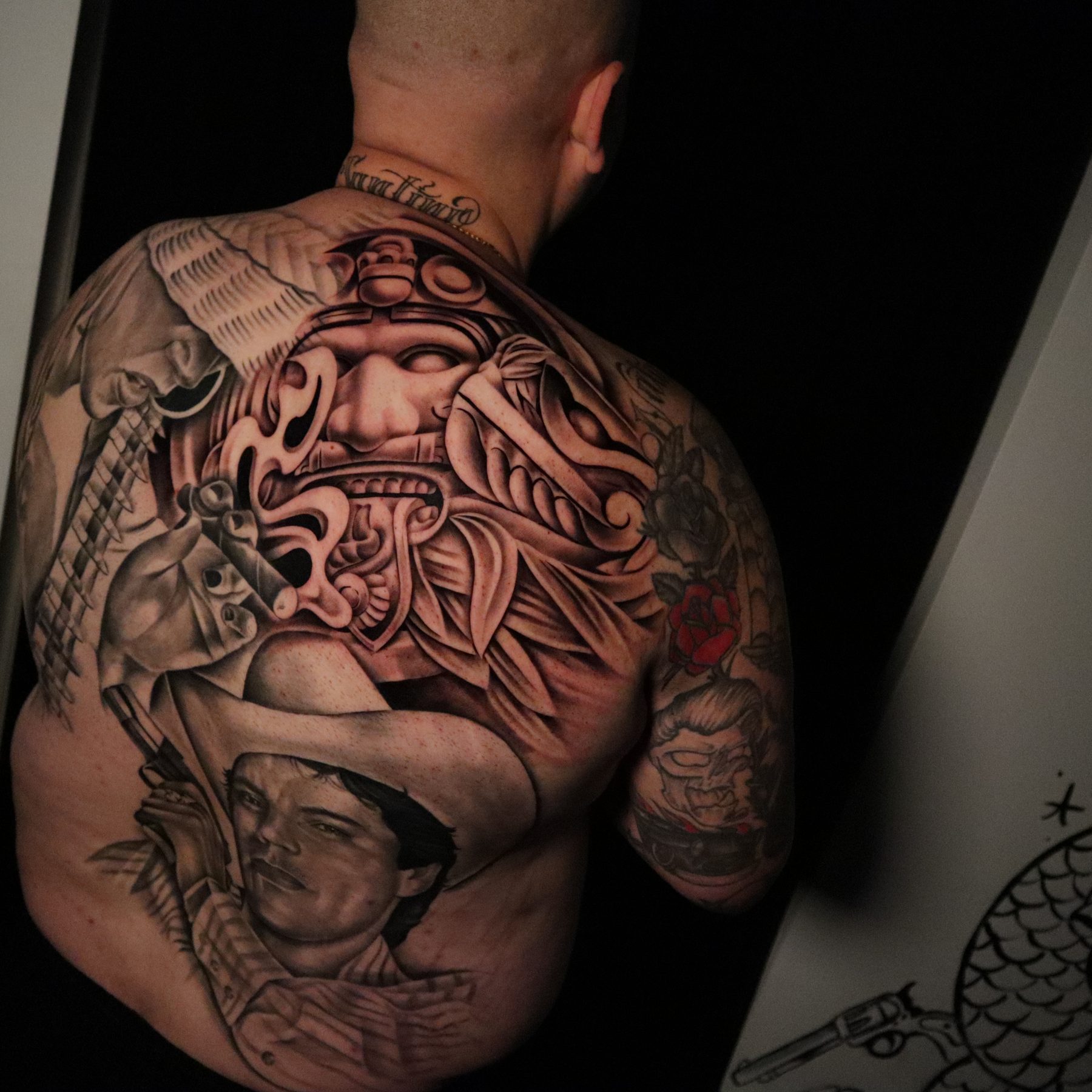 Black and grey Aztec warrior full back piece, tattoo by Keaks Hurtado